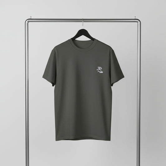 Gray t-shirt with a small logo on a hanger against a gray background