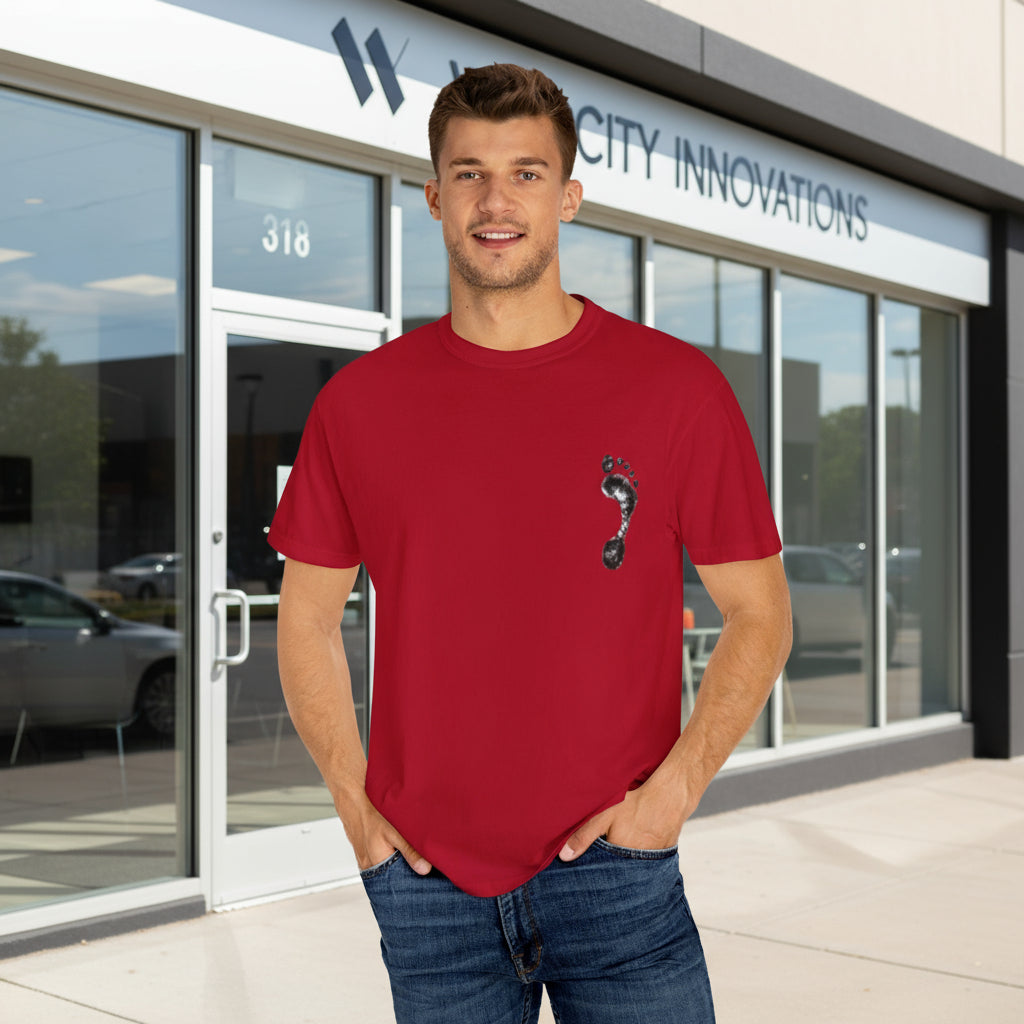 Man wearing a red t-shirt with a small design on a white background