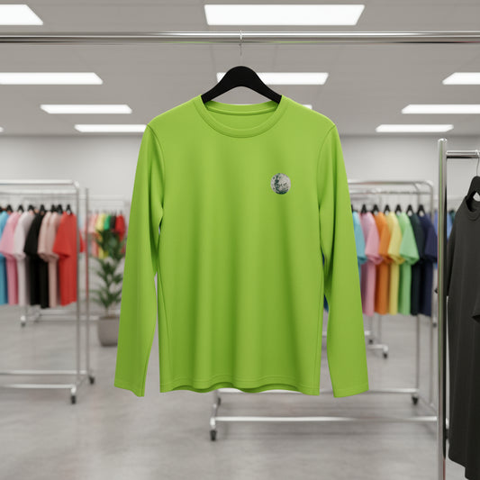 Green long-sleeve shirt on a hanger in a clothing store.