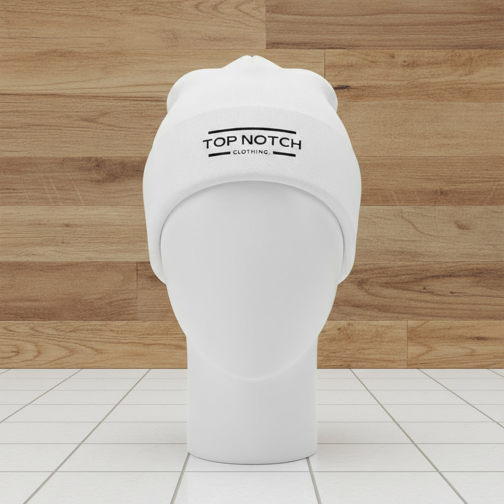 White urinal cover with 'Top Notch Clothing' logo on a wooden wall background