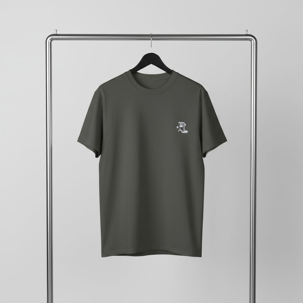 Gray t-shirt with a small logo on a hanger against a gray background