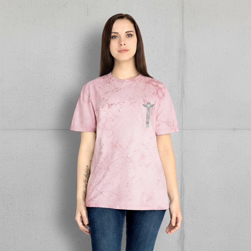 Woman wearing a pink t-shirt with a small design on a white background