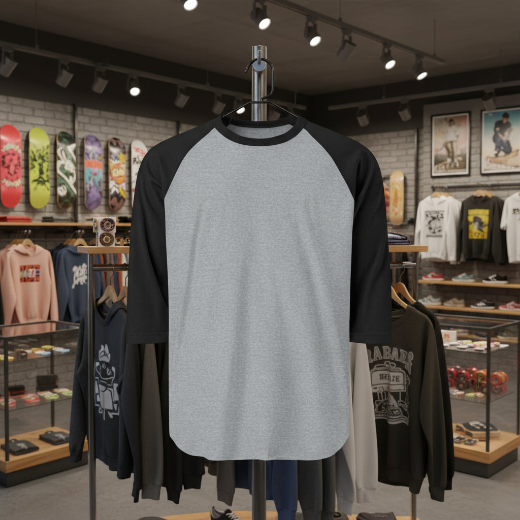 Gray and black baseball shirt on a mannequin in a store setting with various items in the background.